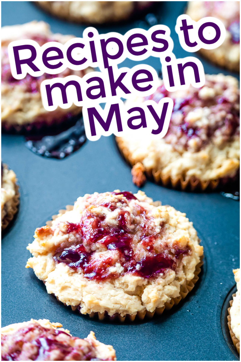 Assorted berry muffins in paper liners on a baking tray with the text "Cook in May: Recipes to make" overlaid at the top.