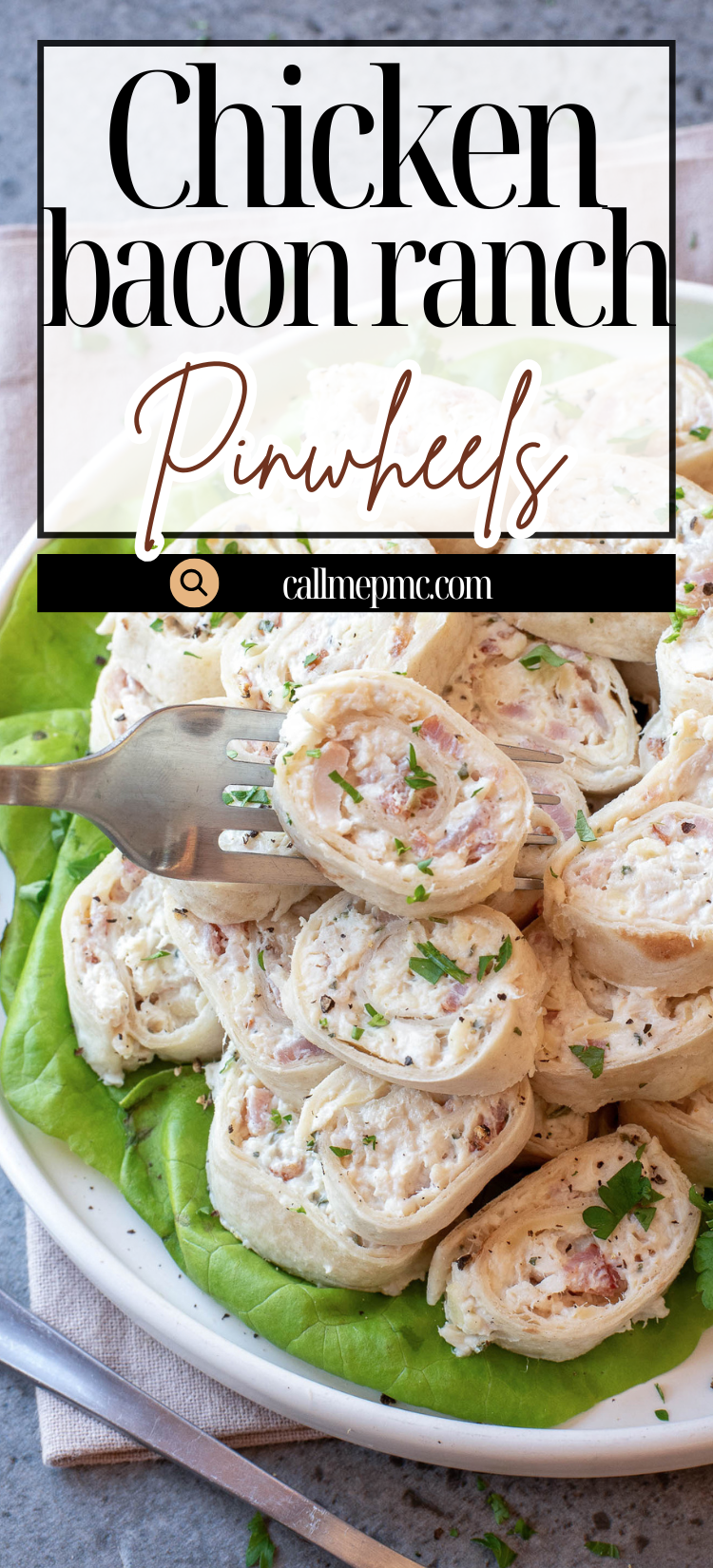 A platter of Chicken Bacon Ranch Pinwheels, garnished with chopped parsley, is served on a bed of lettuce with a wooden spoon.