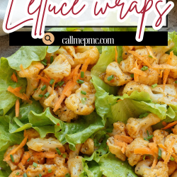 A plate of buffalo cauliflower lettuce wraps with shredded carrots and chopped chives, displayed on a white plate.