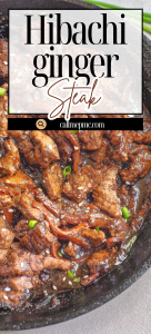Cooked slices of hibachi ginger steak in a cast iron skillet, garnished with chopped green onions.