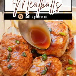 A plate of Tsukune Japanese Meatballs on skewers, garnished with chopped green onions, served with lemon wedges and a spoonful of savory sauce.