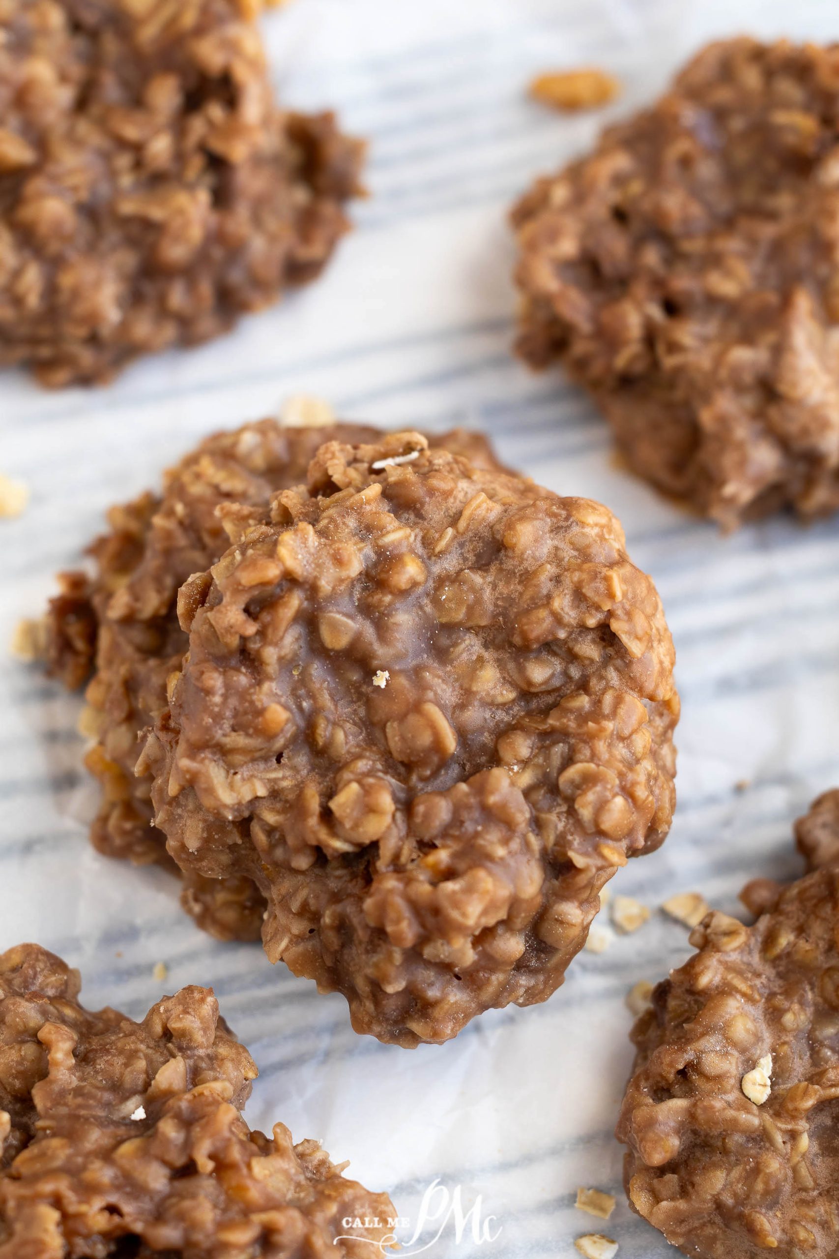 Close-up of several desserts on a marble surface.
