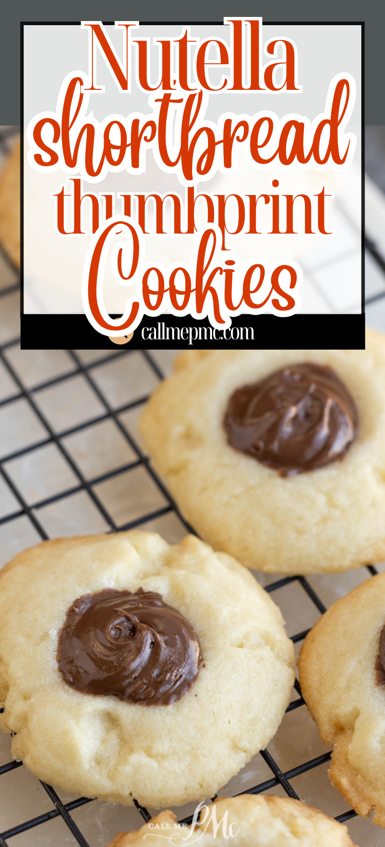 Close-up of Nutella shortbread thumbprint cookies, freshly baked and filled with creamy Nutella, cooling on a black wire rack.