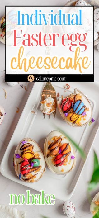 Three egg-shaped cheesecakes topped with colorful candies and chocolate drizzle are arranged on a white tray with a fork resting nearby.