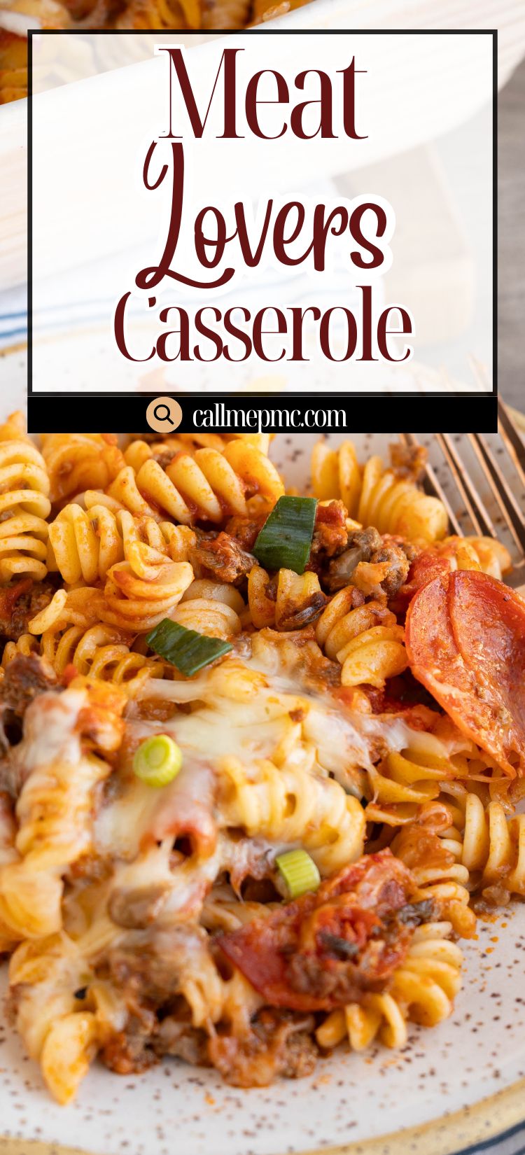 A serving of meat lovers casserole with pasta, ground meat, pepperoni, melted cheese, and green onions on a plate with a fork.