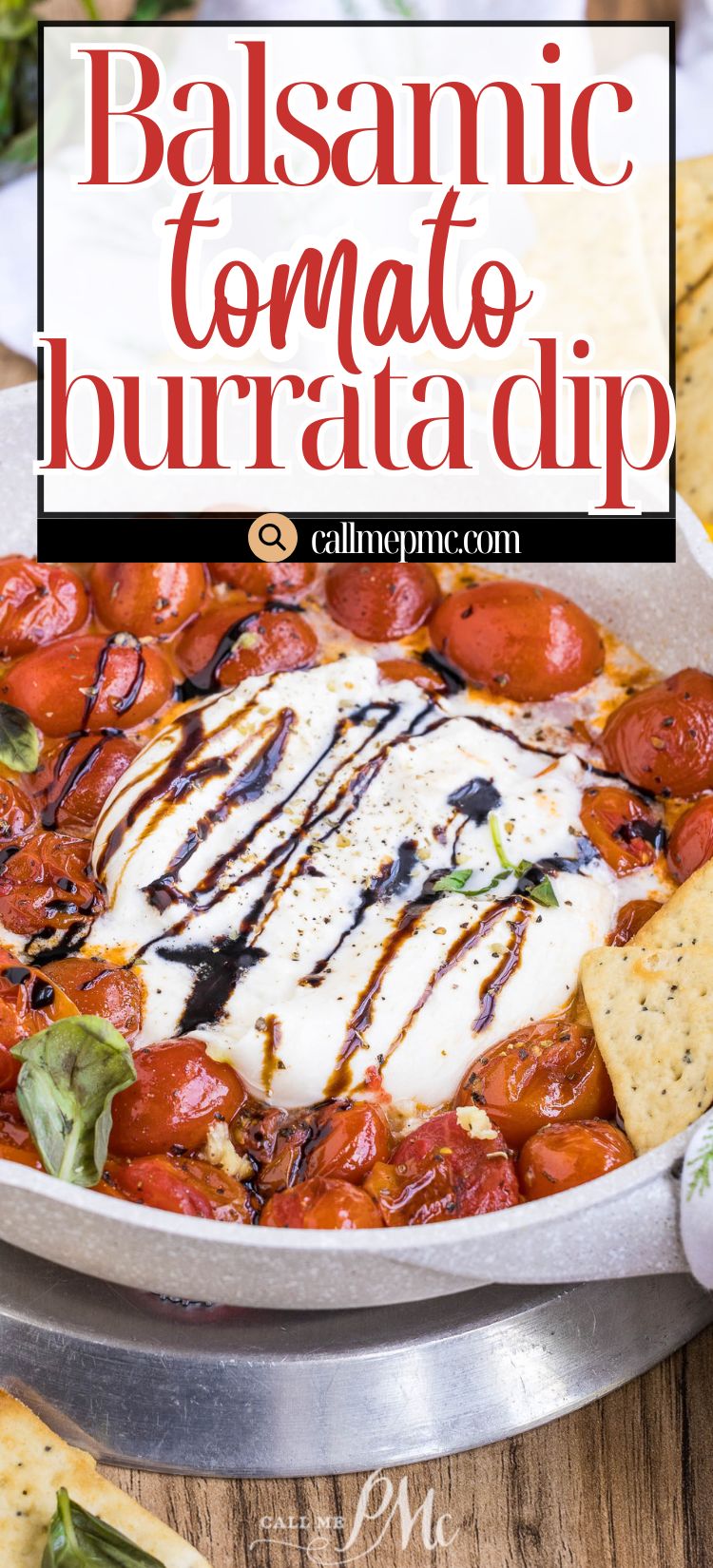 A skillet filled with Balsamic Tomato Burrata Dip, topped with fresh basil and served with crisp crackers for dipping.