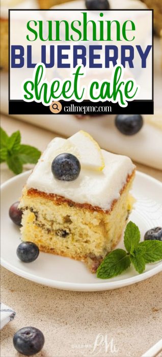 A spring dessert with white frosting, topped with a fresh fruit, is served on a white plate with mint leaves.