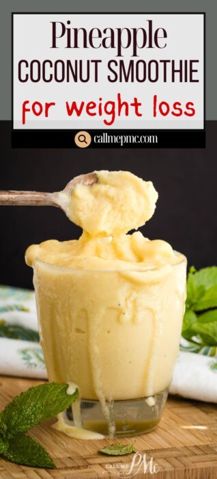 Pineapple Coconut Smoothie in a glass with fresh pineapple garnish